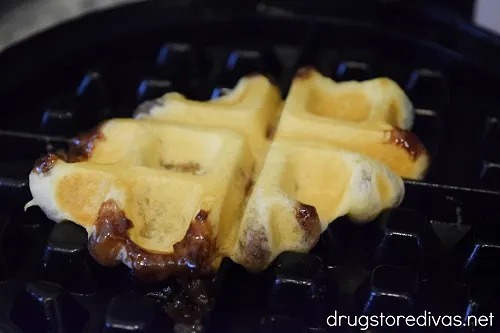 A croffle on a waffle maker.