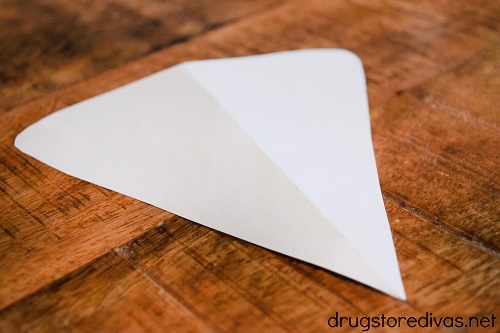 A pizza shape cut from scrap paper.