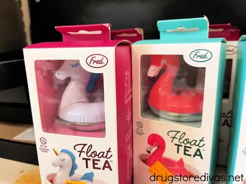 A unicorn float tea infuser next to a flamingo float tea infuser.