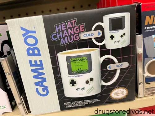 A box for a Game Boy Heat Changing Mug on a shelf.