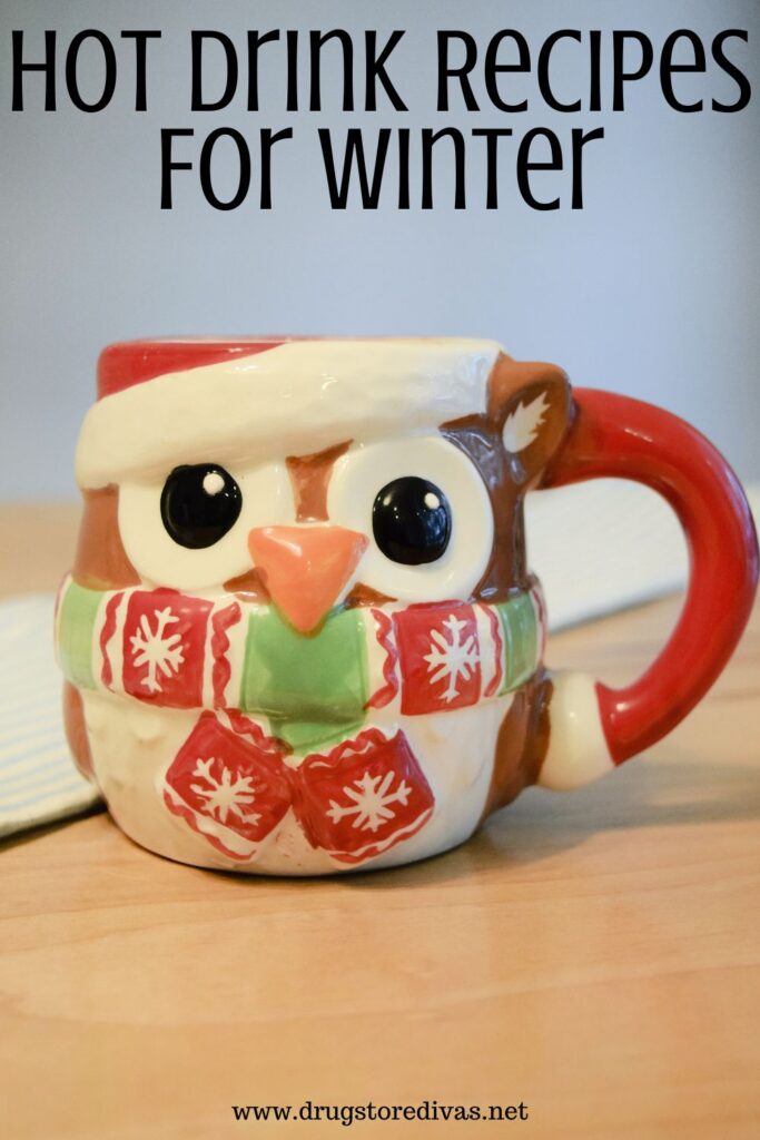 A mug with an owl dressed in a scarf and hat with the words "Hot Drink Recipes For Winter" digitally written above it.