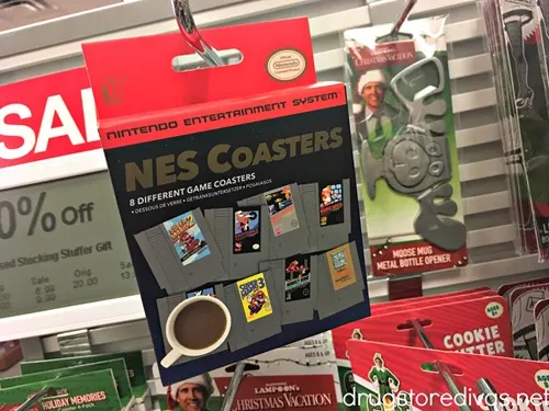 A package of Nintendo coasters hanging on a shelf.
