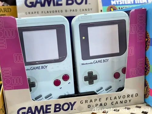 Packs of Game Boy mints on a shelf in a store.