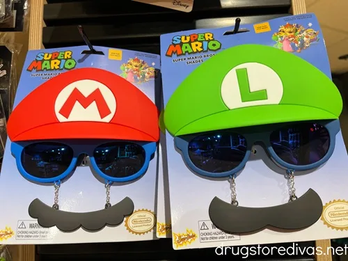 A Super Mario and a Luigi sunglass set with a hat and mustache.