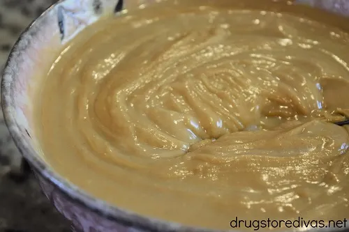 Melted peanut butter in a bowl.