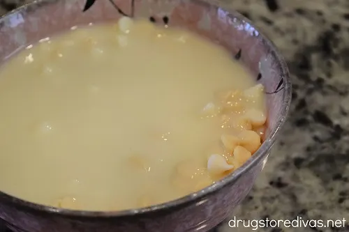 Melted white chocolate chips in a bowl.