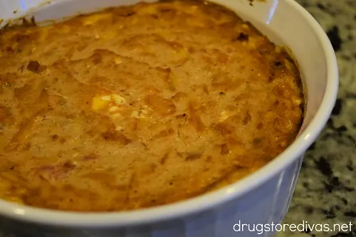 Easy Cheesy Refried Bean Dip in a casserole pan.
