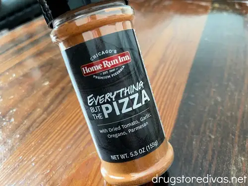 A jar of pizza seasoning.