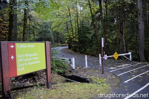 A sign for a trail at 5 Mile Drive at Point Defiance Park in Tacoma, Washington.