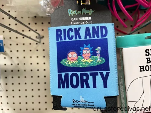 A can coozie with the words Rick and Morty on it and a cartoon image.