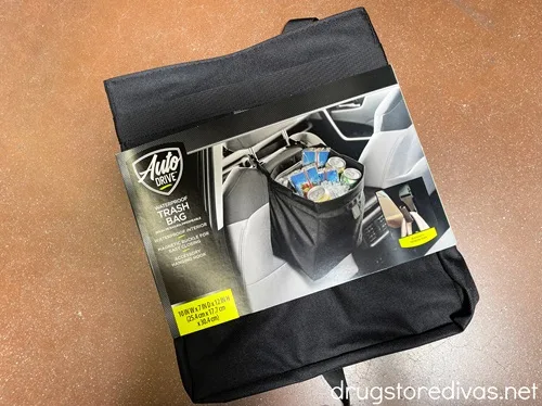 A box with a car trash bag in it.