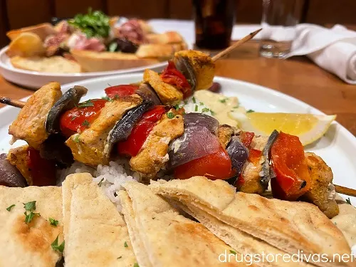 Mediterranean kabobs and pita bread .