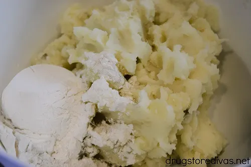 Flour and mashed potatoes in a bowl.