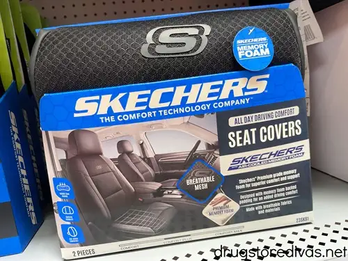 A pack of Skechers Memory Foam Seat Covers in a pack on a shelf in a store.