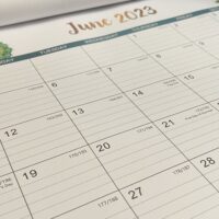 A calendar open to June 2023 with the words 