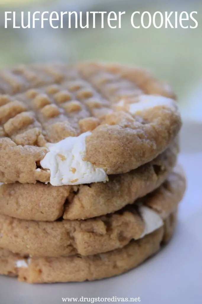 Four marshmallow and peanut butter cookies stacked on top of each other with the words "Fluffernutter Cookies" digitally written on top.