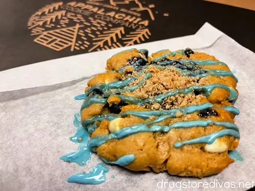 A Blueberry Lemon Streusel cookie on parchment paper from Appalacia Cookie Co in Boone, NC.