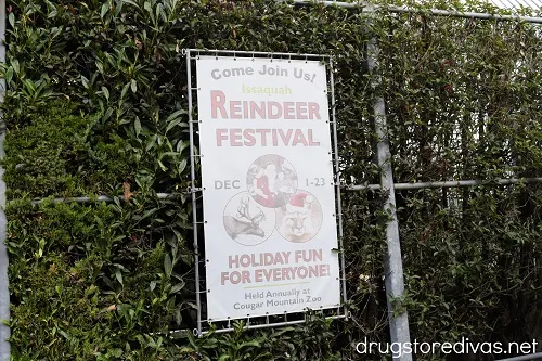 A sign advertising the Issaquah Reindeer Festival at Cougar Mountain Zoo in Issaquah, Washington.