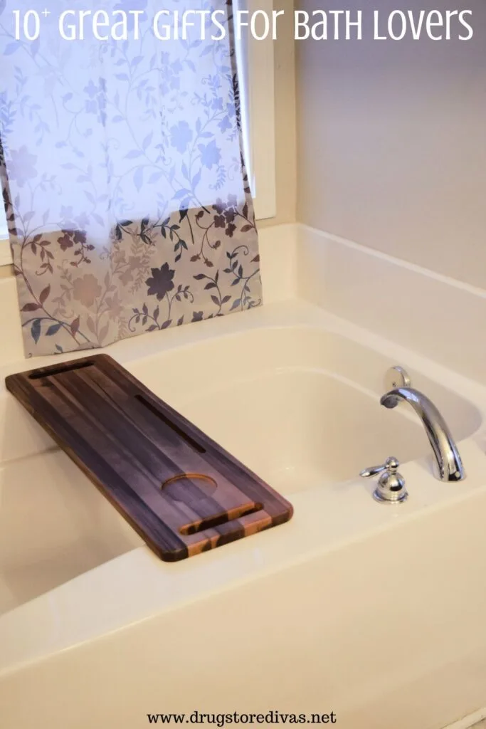 A bathtub with a tray across and the words "10+ Great Gifts For Bath Lovers" digitally written on top.
