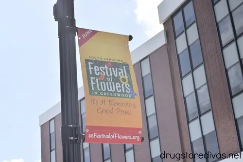 A sign advertising the South Carolina Festival of Flowers.