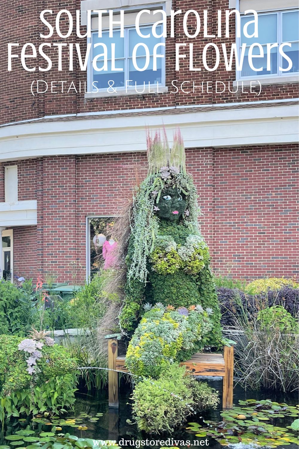 A topiary shaped like a mermaid with the words 