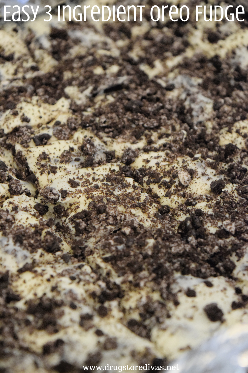 Uncut Oreo fudge in a pan with the words 