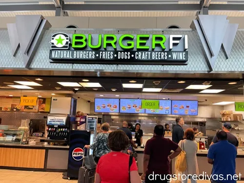 A BurgerFi restaurant in an airport.