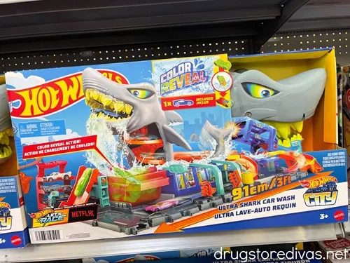 A Hot Wheels City Ultra Shark Car Wash box on a shelf.