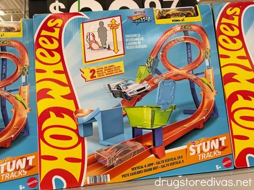 A Hot Wheels Action Vertical-8 Jump Track Set box on a shelf in a store.