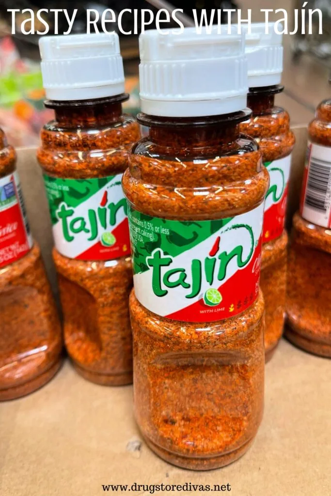 Bottles of Tajin seasoning on a shelf with the words "Tasty Recipes With Tajin" digitally written on top.
