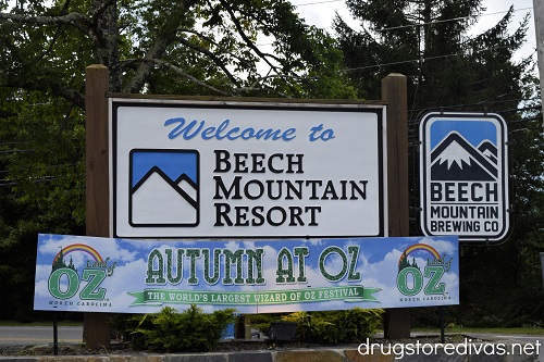 A sign welcoming you to Beech Mountain Resort and another advertising Autumn at Oz at the Land of Oz.