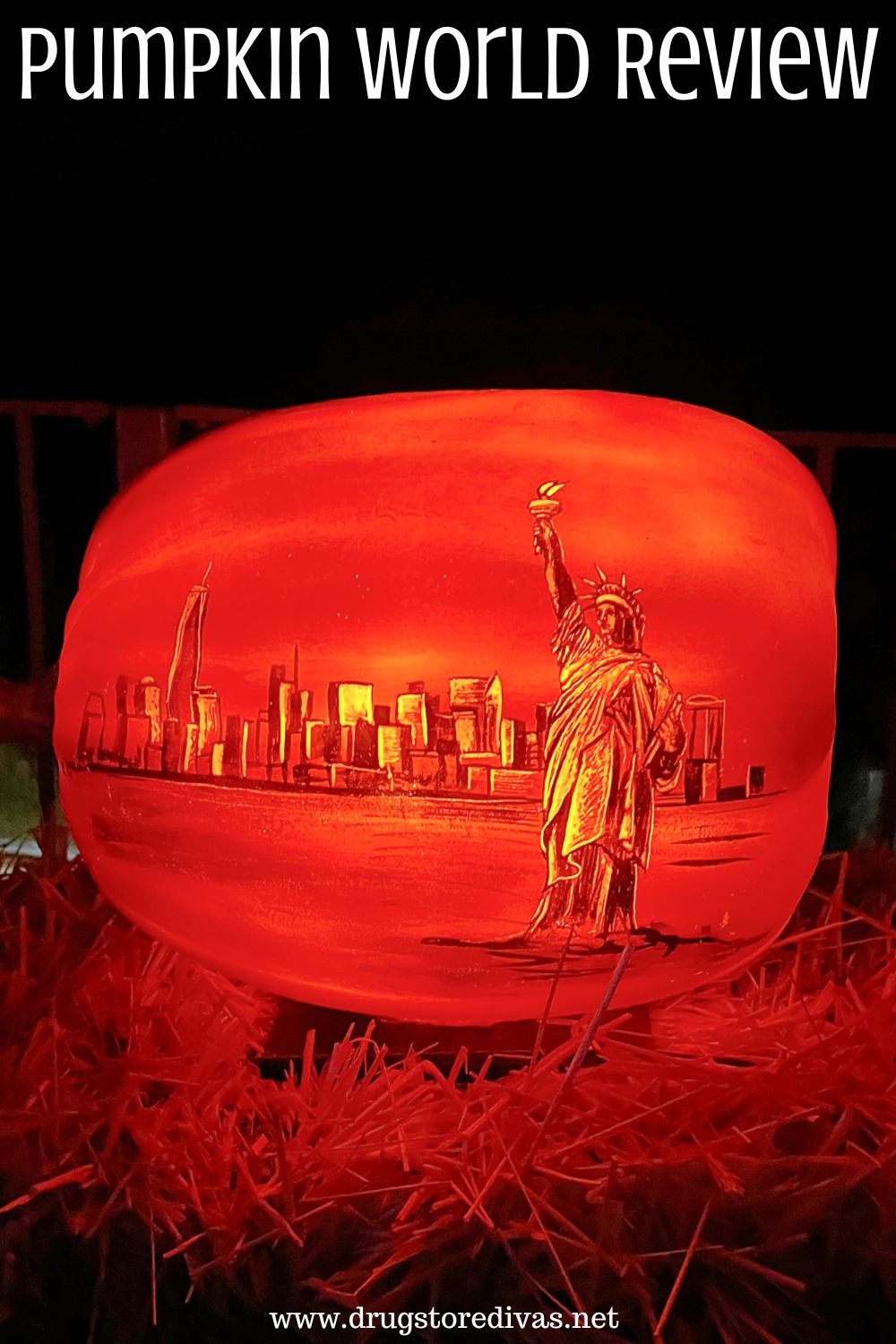 A pumpkin with the New York skyline carved into it with the words 