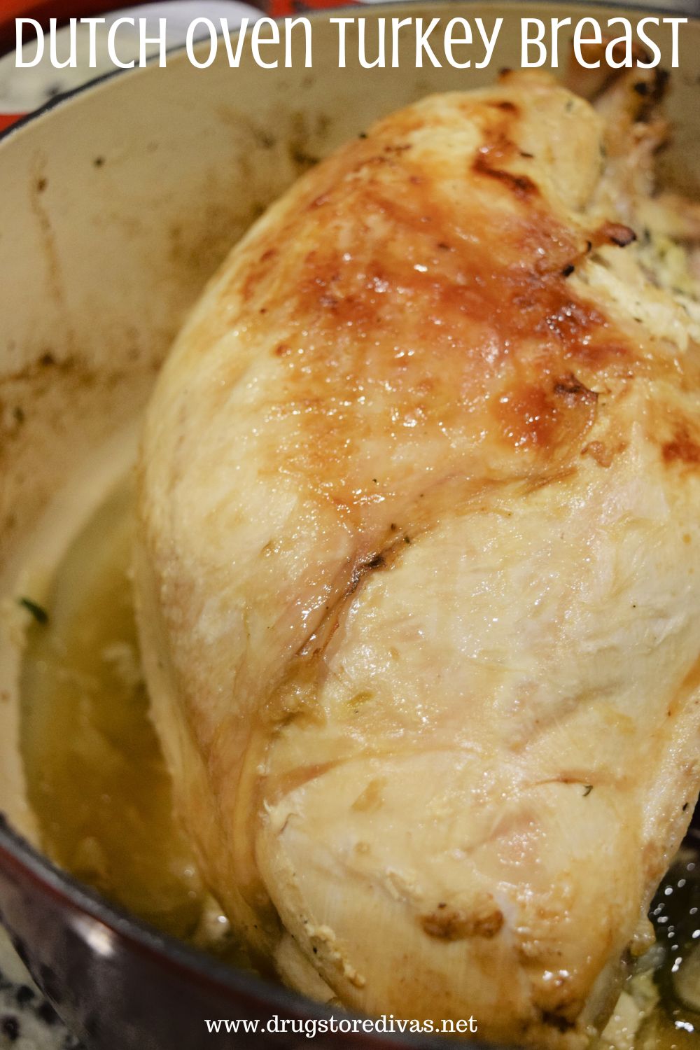 A golden brown turkey breast in a Dutch oven with the words 