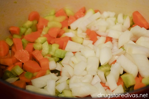 Chopped celery, carrots, and onion in a Dutch oven.