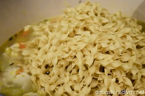 Dry egg noodles in a Dutch oven.