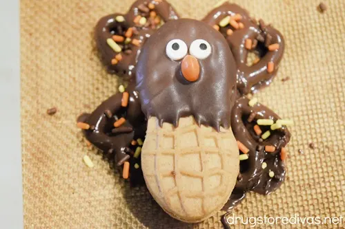 A Nutter Butter Turkey Cookie with sprinkles on the feathers.