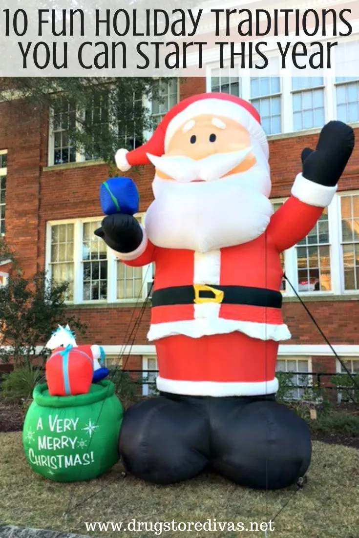 An inflatable Santa and gift bag with the words 