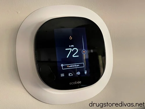 An ecobee smart thermostat on the wall.