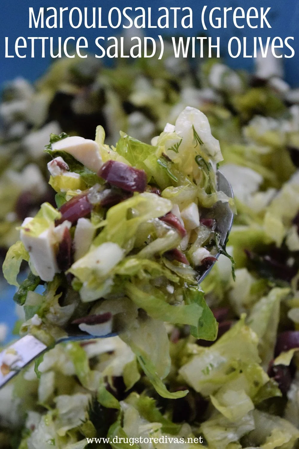 A spoon holding lettuce, feta, and olives with the words 