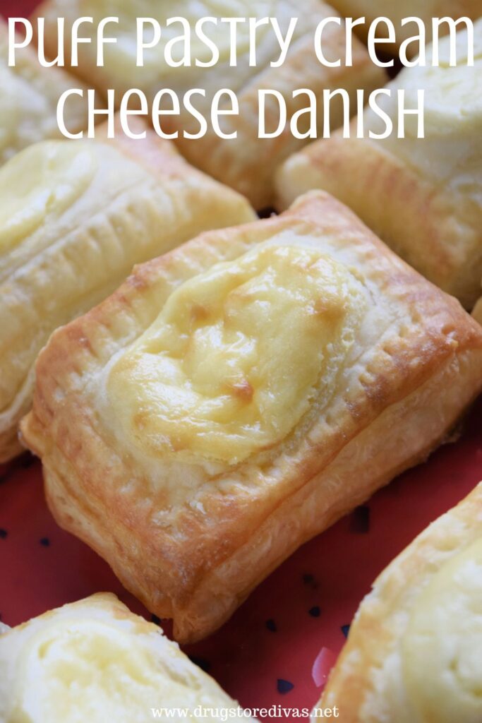 Many pieces of cheese danish with the words "Puff Pastry Cream Cheese Danish" digitally written on top.
