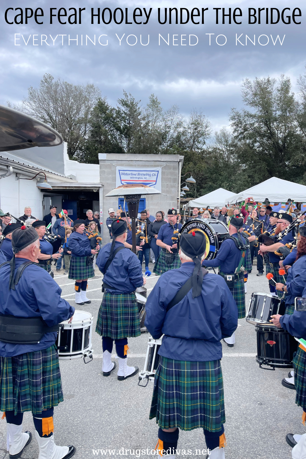 A pipe and drum band in front of Waterline Brewing Co. in Wilmington, NC with the words 