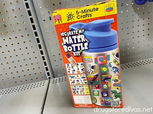 A decorate your own water bottle kit on a shelf.