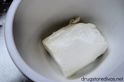 Cream cheese in a white bowl.