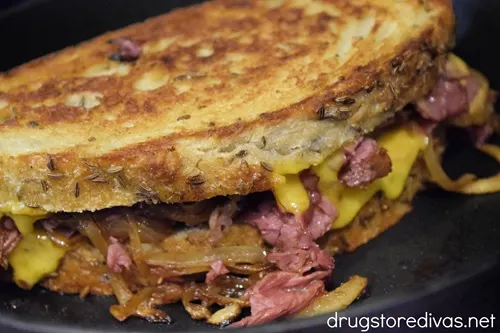 A grilled cheese corned beef sandwich.
