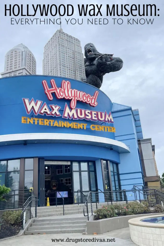 The outside of a building that looks like skyscrapers and has a King Kong hanging off the side of it with the words "Hollywood Wax Museum: Everything you need to know" digitally written on top.