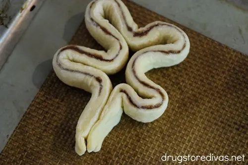 A strip of puff pastry shaped like a shamrock.