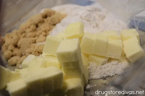 Cubes of butter, brown sugar, and flour in a bag.