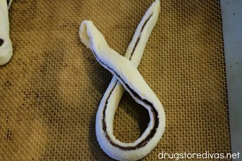 A piece of puff pastry in a loop shape.