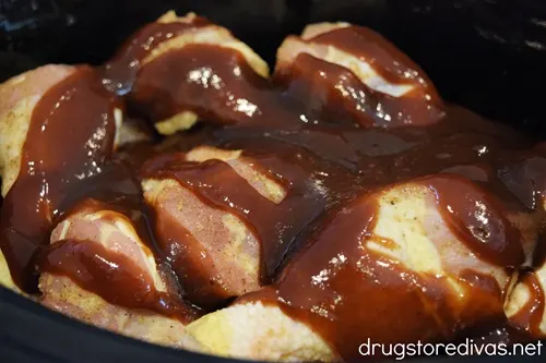 Chicken with sauce in a slow cooker.