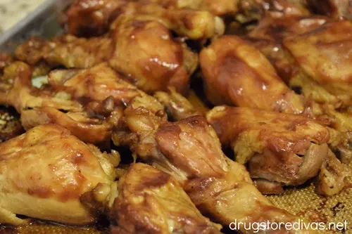 A tray of slow cooker BBQ chicken drumsticks.